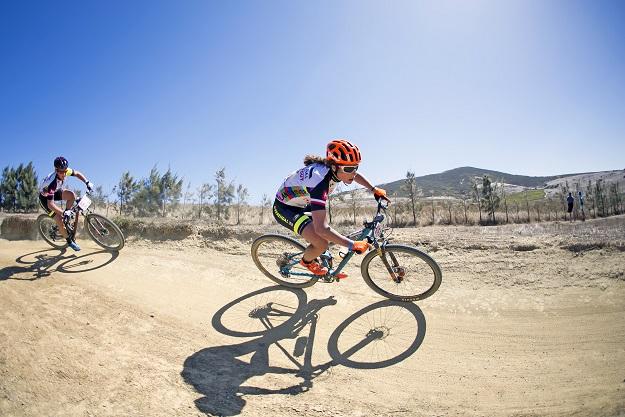 Elisabeth Brandau and Hielke Elferink riding together (Mark Sampson/Cape Epic/Sportzpics)